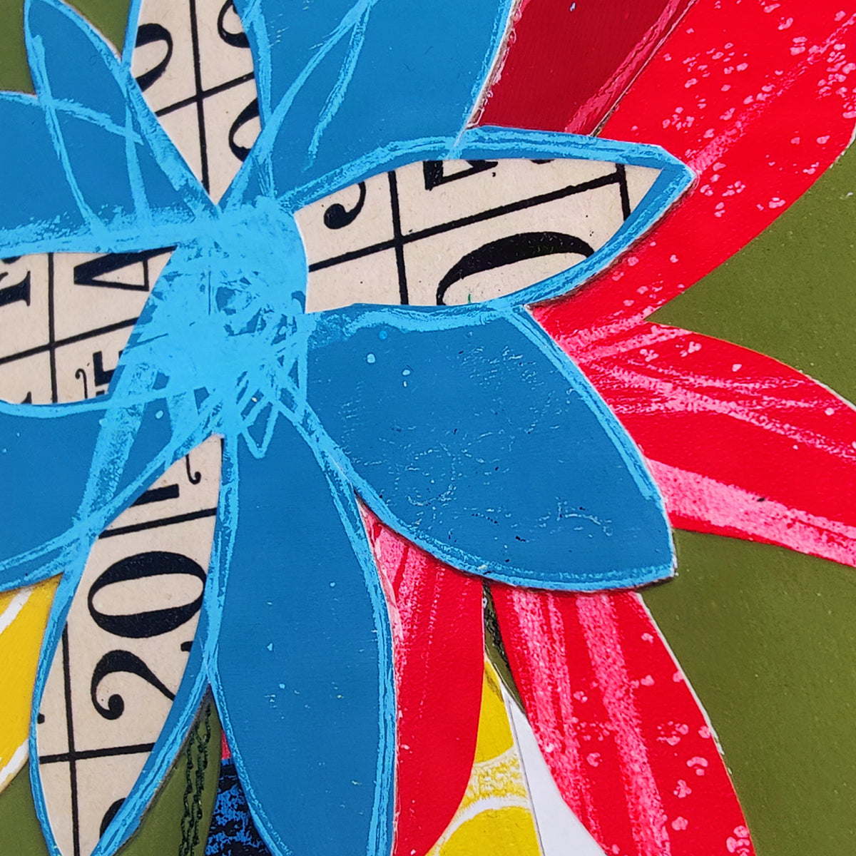 A close-up of a colorful abstract floral artwork with layered flower shapes.