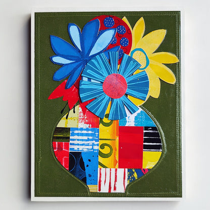 Abstract floral artwork featuring large stylized flowers in blue, yellow, red, and light blue arranged above a patchwork-like vase shape on an olive green background.