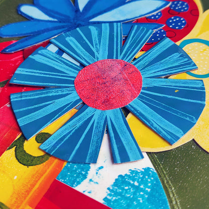 Detail image of red, blue and yellow flowers 